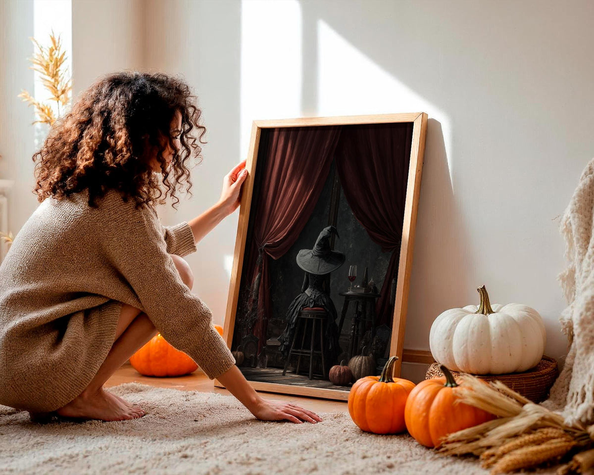 Witch Sitting Poster – Mystical Halloween wall art of a witch seen from behind, magical gothic print for cozy autumn hom