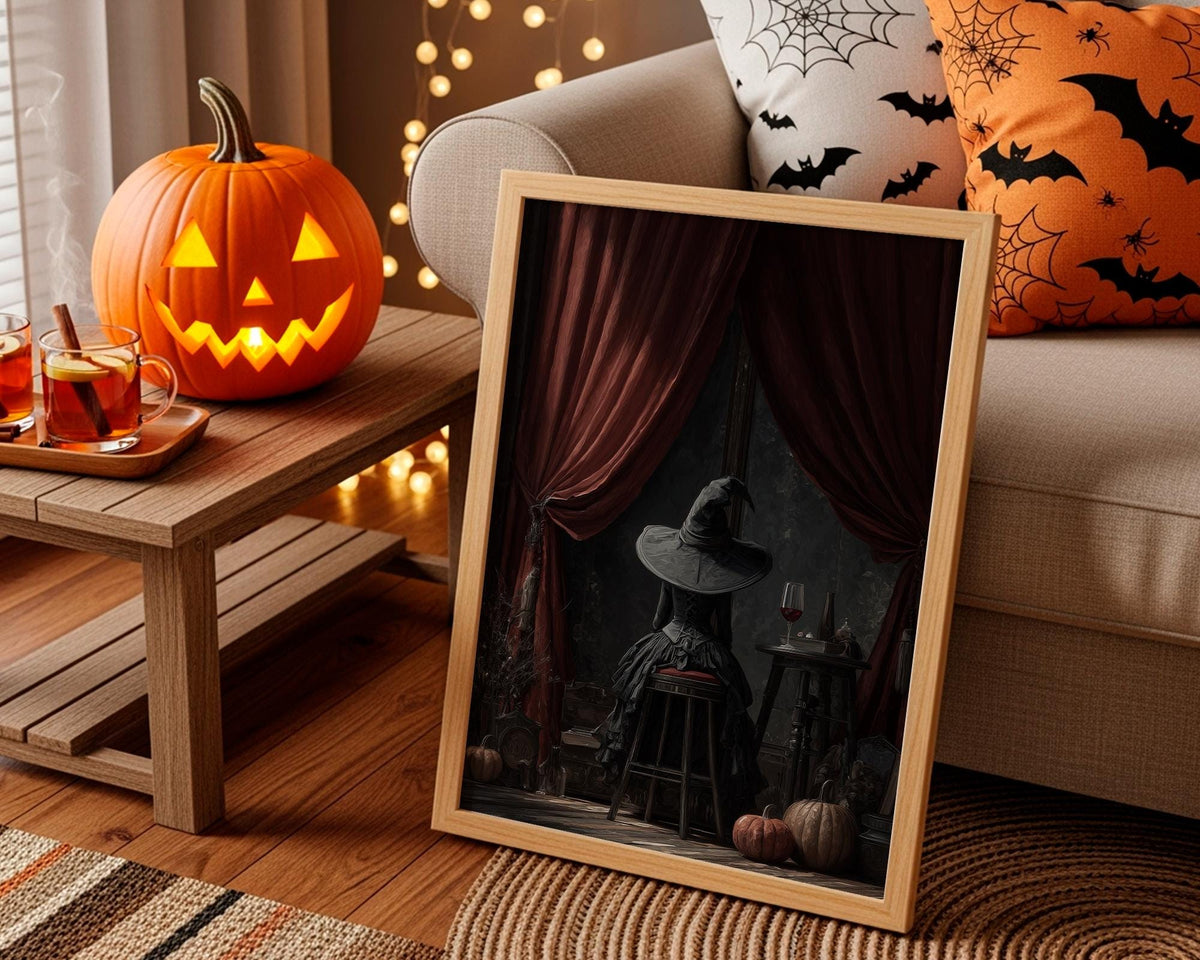 Witch Sitting Poster – Mystical Halloween wall art of a witch seen from behind, magical gothic print for cozy autumn hom